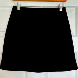 The limited stretch black mini skirt